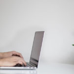 Student writing a letter of intent for medical school